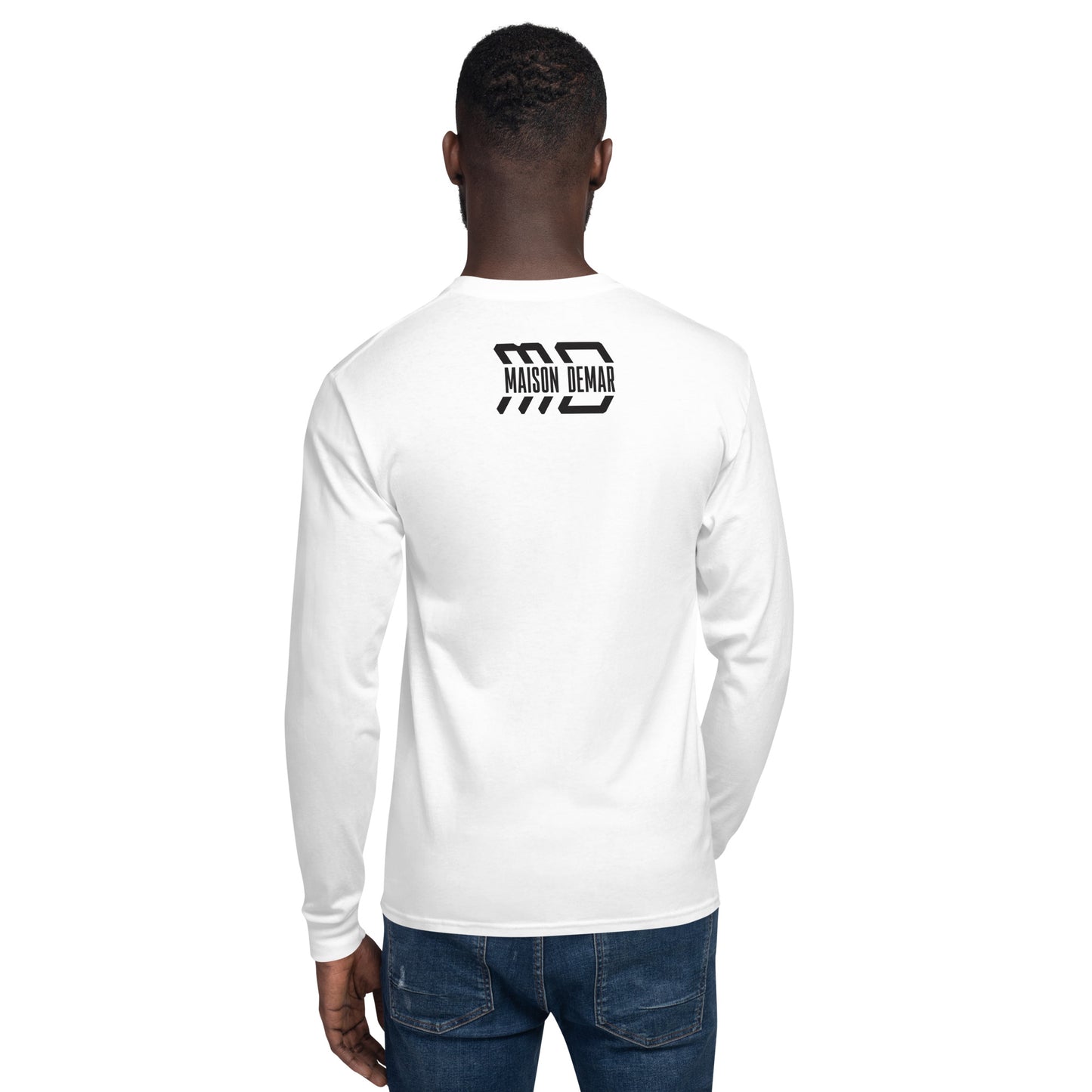 Person wearing a white long-sleeve shirt with a logo on the back, standing against a white background