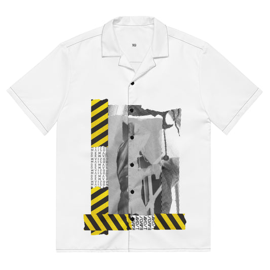 White shirt with black and yellow design on a white background