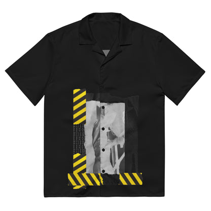 Black shirt with yellow and gray design on a white background