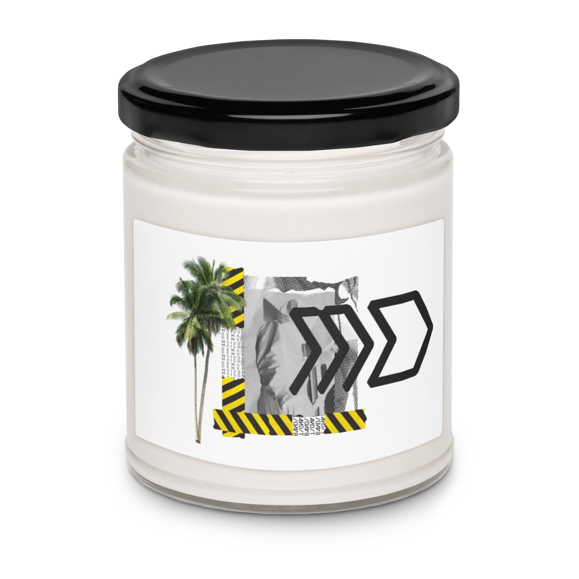 Candle jar with a black lid and a label featuring a palm tree, warning signs, and arrows on a white background.