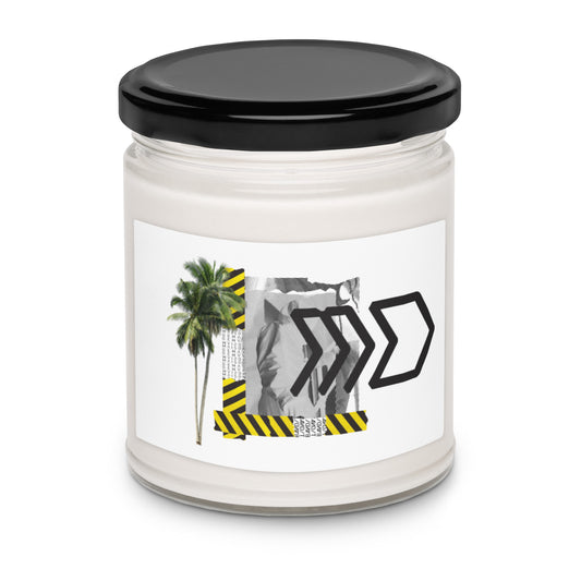 Candle jar with a black lid and a label featuring a palm tree, warning signs, and arrows on a white background.